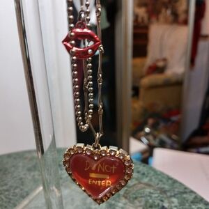 Ornate Red and Gold Heart Necklace with Bow